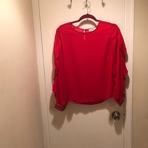 Red elegant top with embellished details!